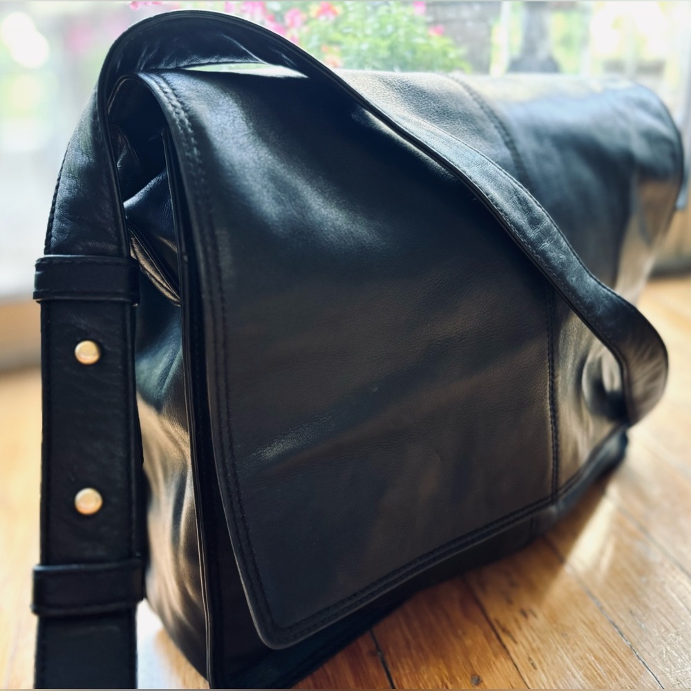 Vintage Donna Karan Leather Messenger Style Crossbody Bag
Like New
Black